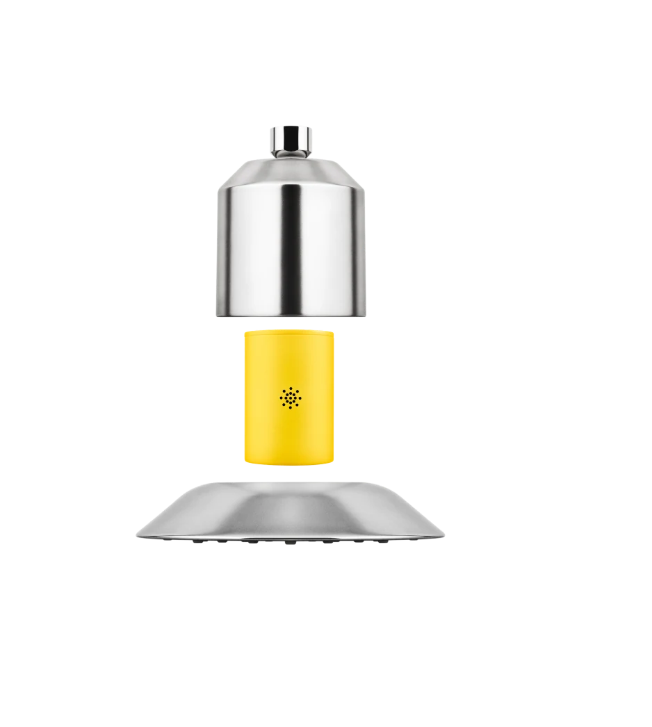 The Afina showerhead with its filter cartridge shown between the two halves